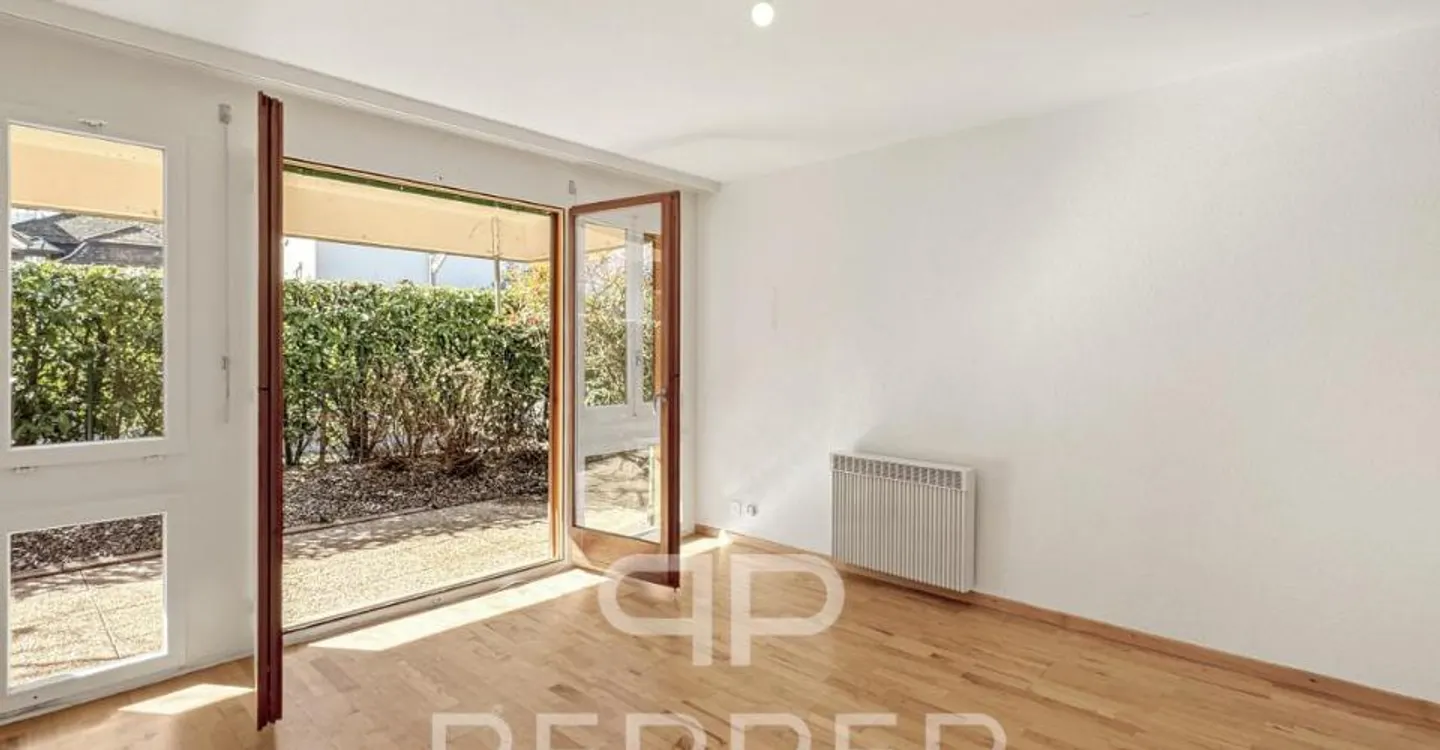 Vaste appartement en rez-de-jardin au coeur de Chailly - Foto 10 von 12