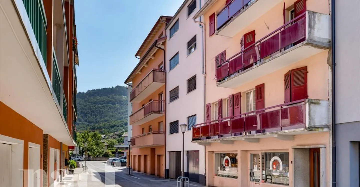 Mixed-use building consisting of a commercial space and 4 apartments in the city center of Monthey - Photo 5 of 13