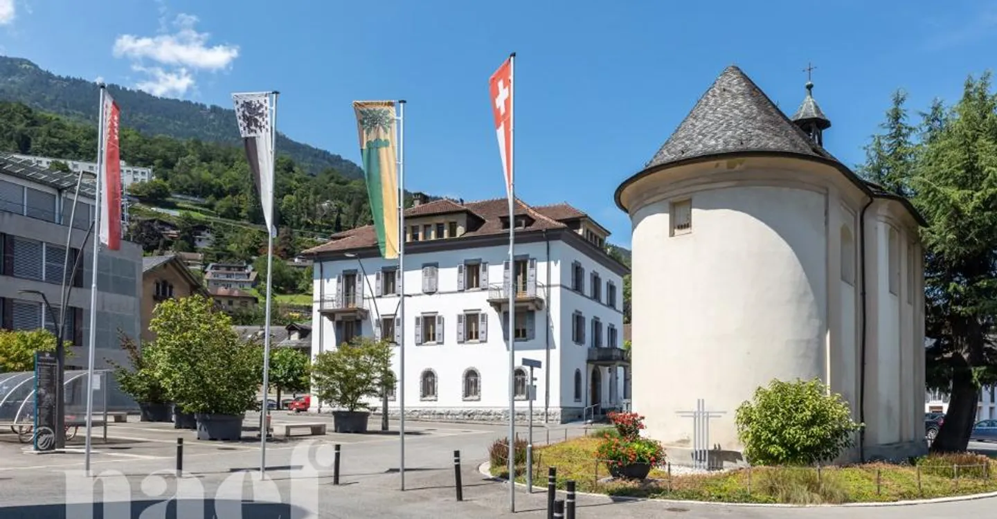 Mixed-use building consisting of a commercial space and 4 apartments in the city center of Monthey - Photo 6 of 13