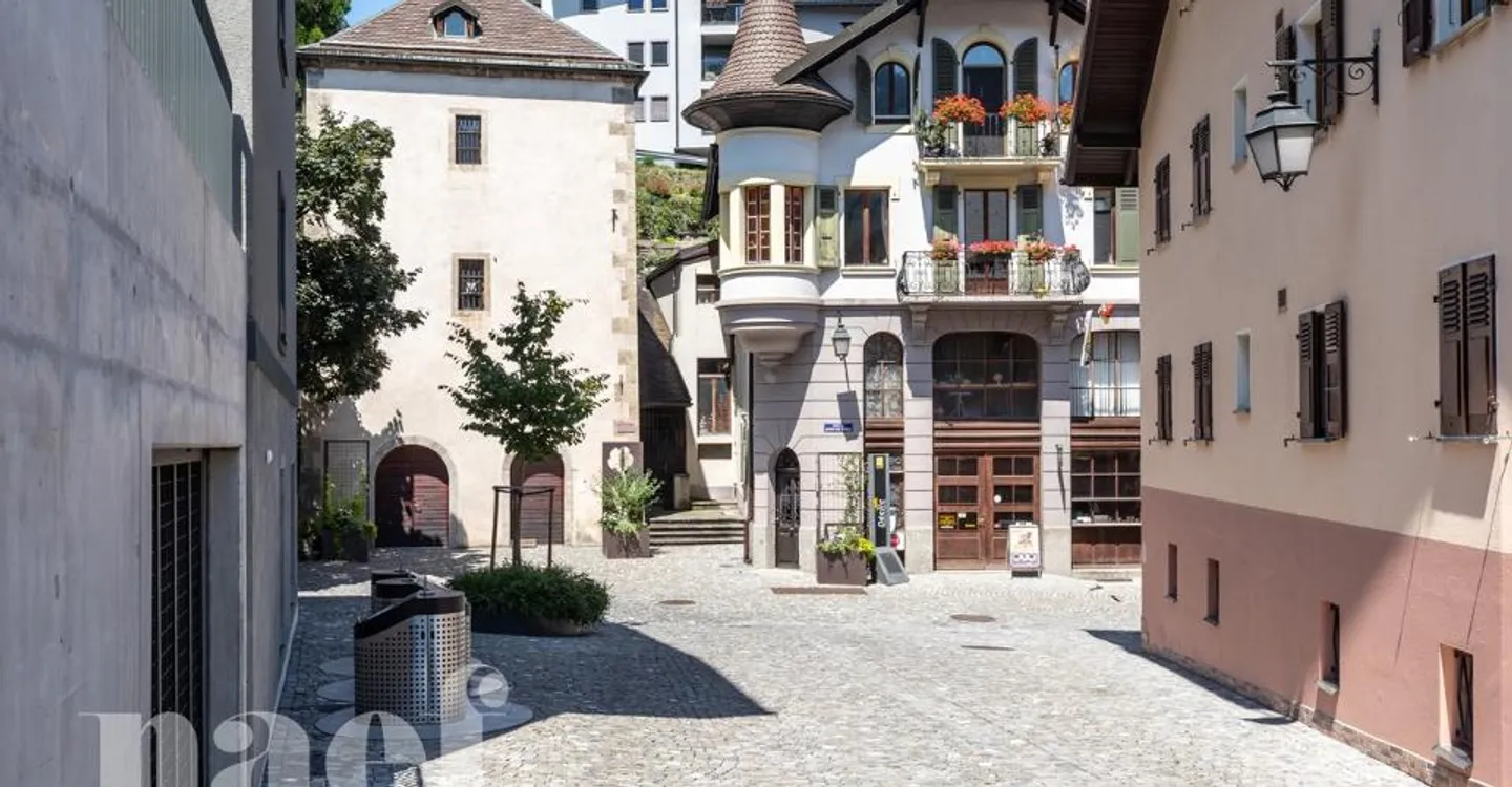 Mixed-use building consisting of a commercial space and 4 apartments in the city center of Monthey - Photo 9 of 13