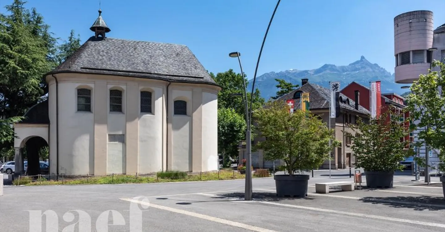 Mixed-use building consisting of a commercial space and 4 apartments in the city center of Monthey - Photo 11 of 13