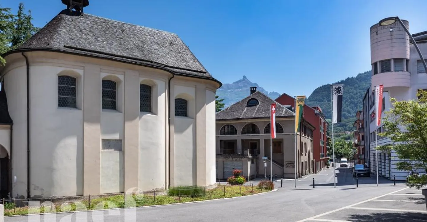 Mixed-use building consisting of a commercial space and 4 apartments in the city center of Monthey - Photo 12 of 13