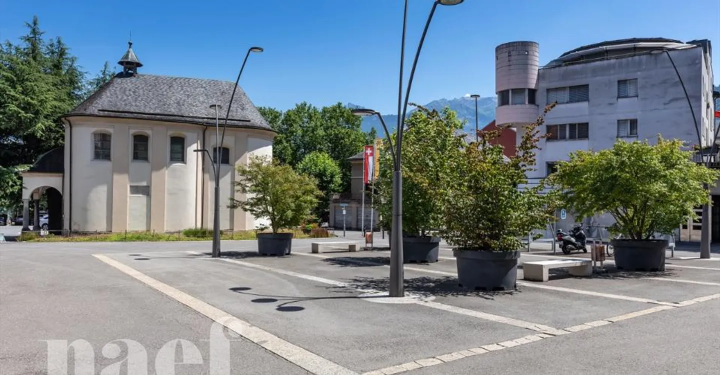 Mixed-use building consisting of a commercial space and 4 apartments in the city center of Monthey - Photo 13 of 13