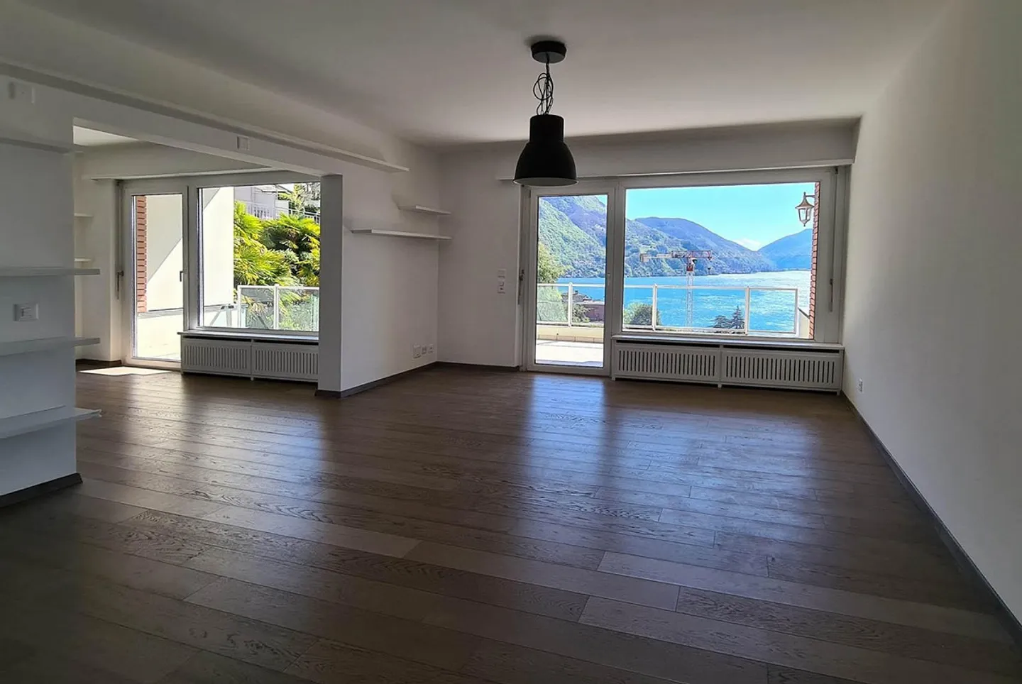 GERÄUMIGE 3.5 ZIMMER MIT EINZIGARTIGEM SEEBLICK IN LUGANO CASTAGNOLA - Foto 3 von 9