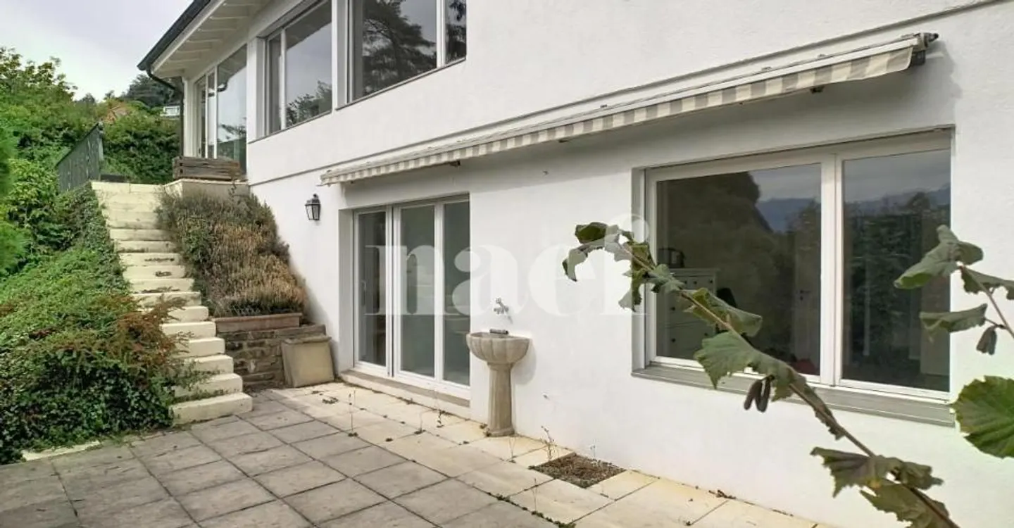 Charming House with Lake View - Photo 1 of 8