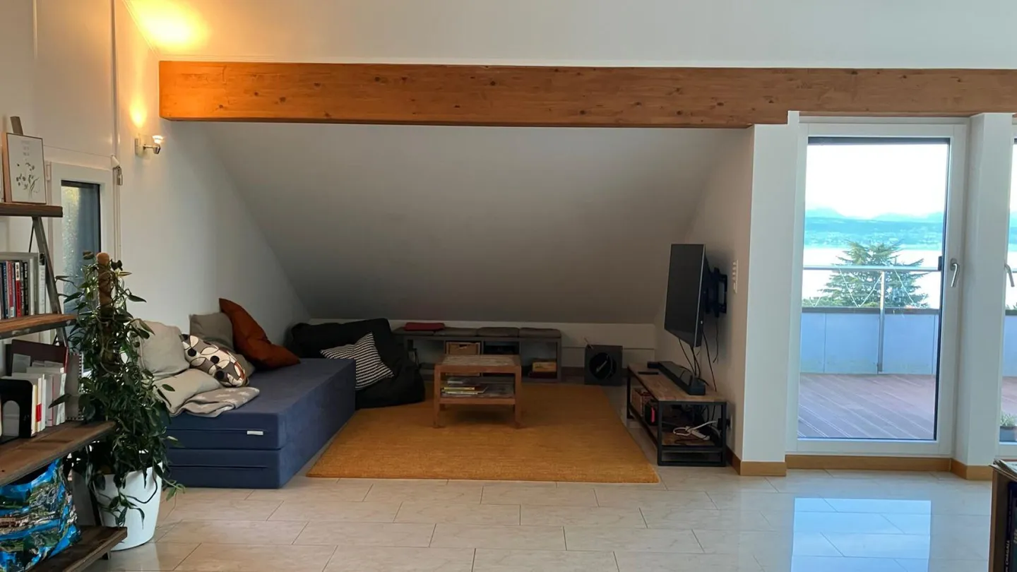 Attic with mezzanine and panoramic view of the lake and mountains! - Photo 8 of 20