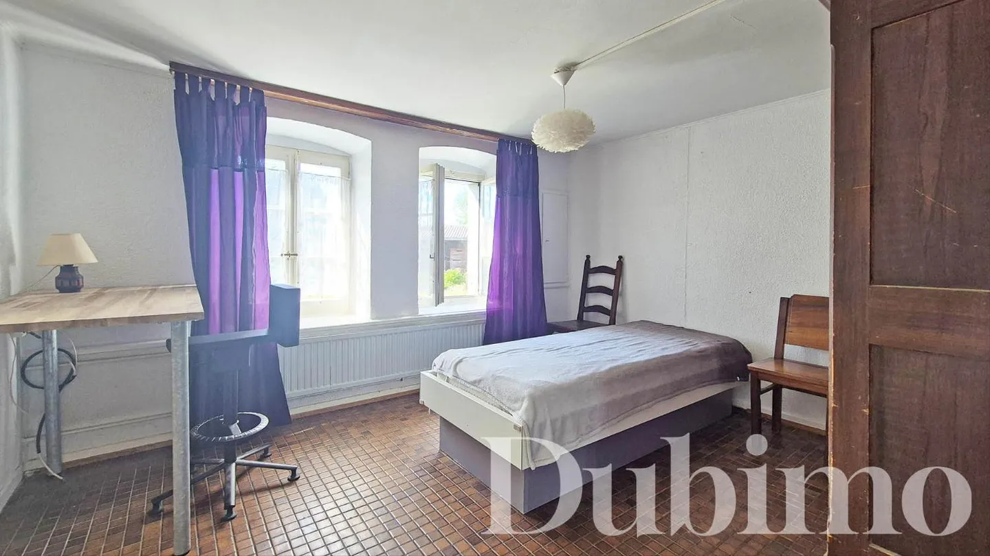 Familienhaus mit 2 Wohnungen, privatem Garten, Keller und Möglichkeit zur Schaffung einer 3. Wohnung - Foto 10 von 13