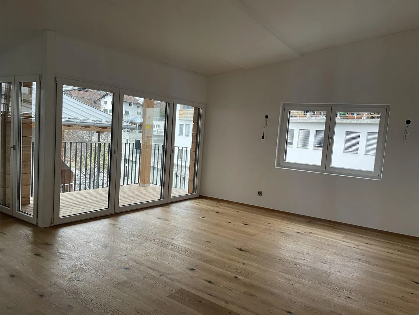 Charmante Dachwohnung in Trin - Foto 1 von 4