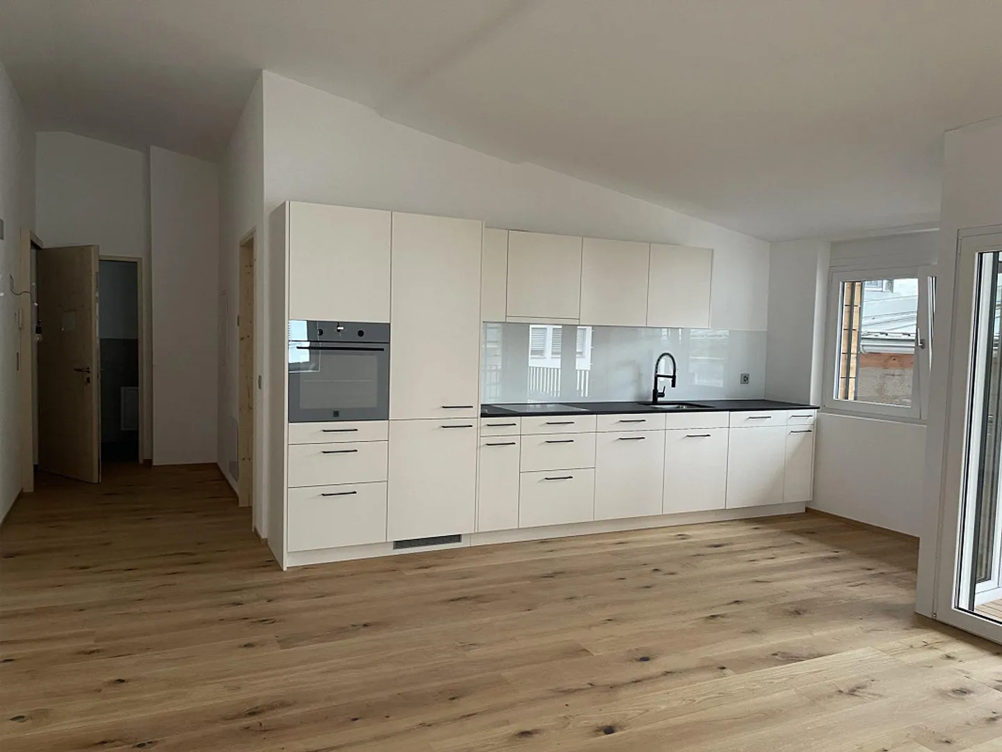 Charmante Dachwohnung in Trin - Foto 2 von 4