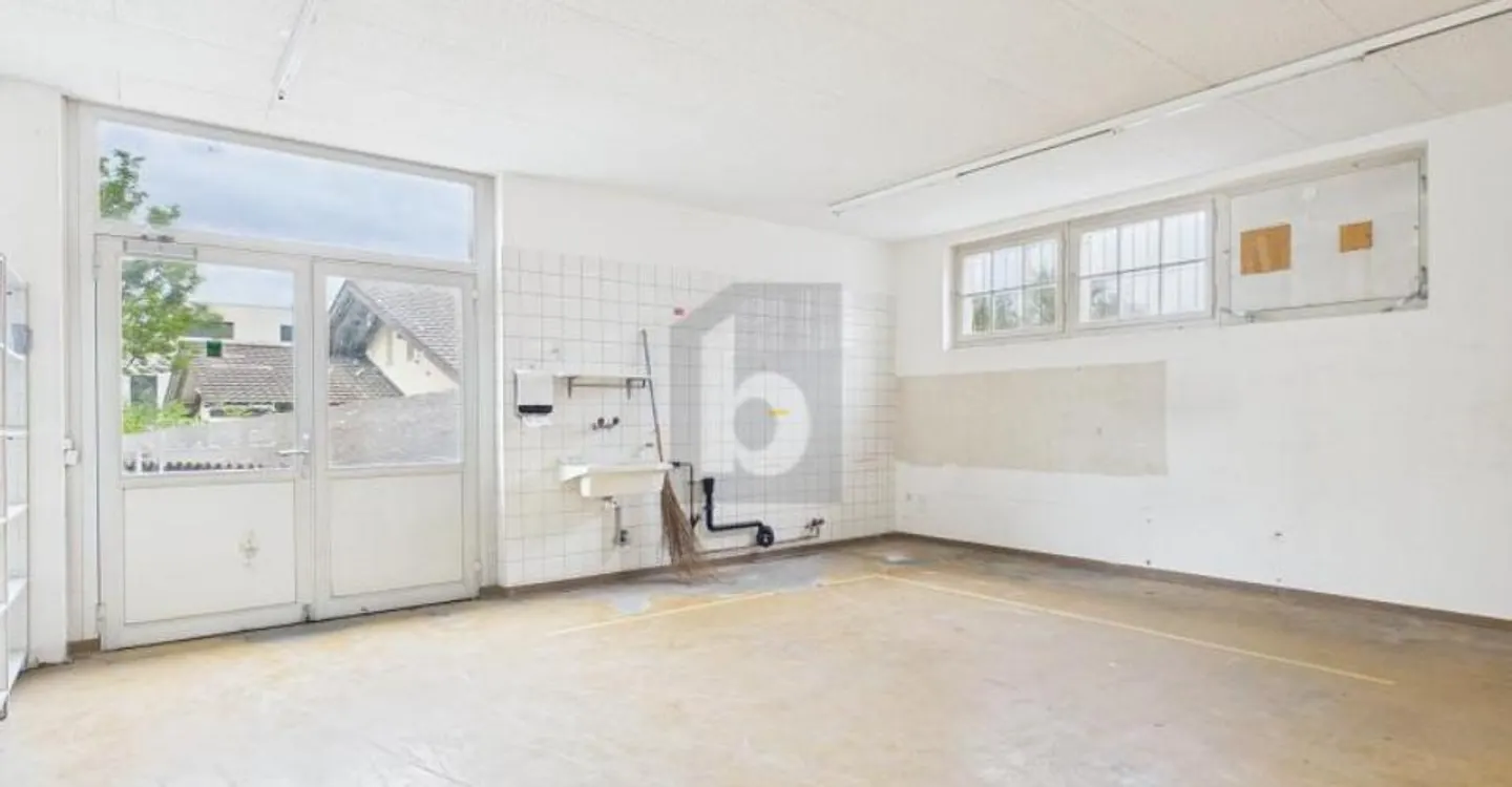 VERSATILE USAGE IN A CENTRAL LOCATION - Photo 1 of 4