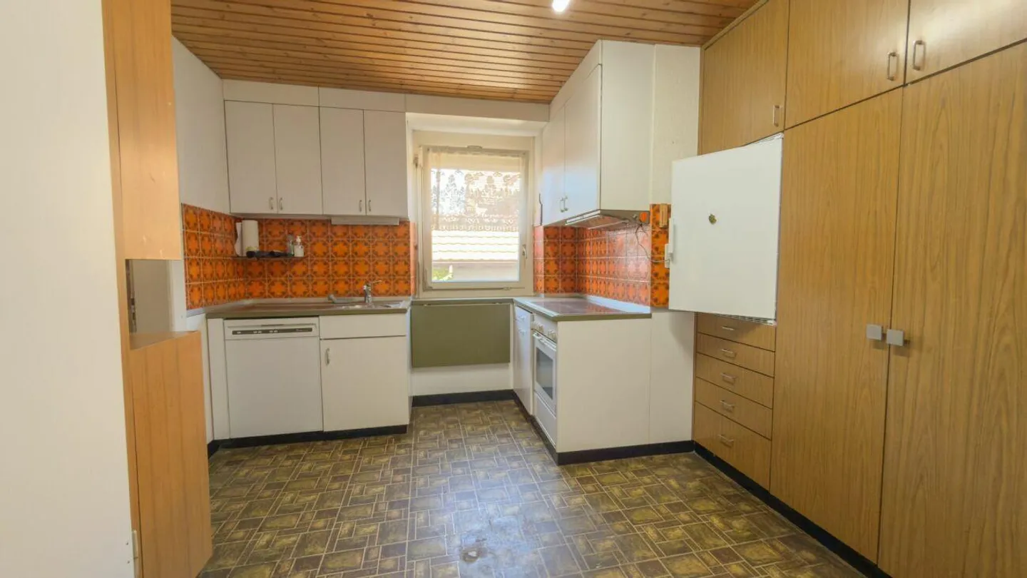 Two-family house with substance and development potential in Buchs - Photo 2 of 5