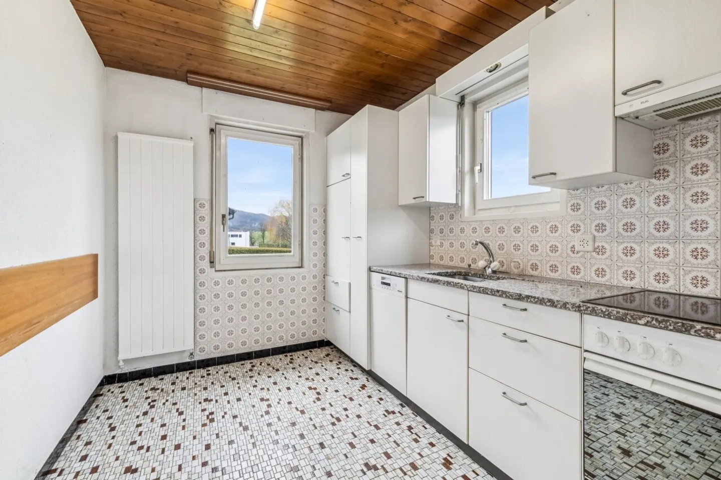 Maison individuelle avec grand potentiel à Rossemaison - Photo 4 sur 11