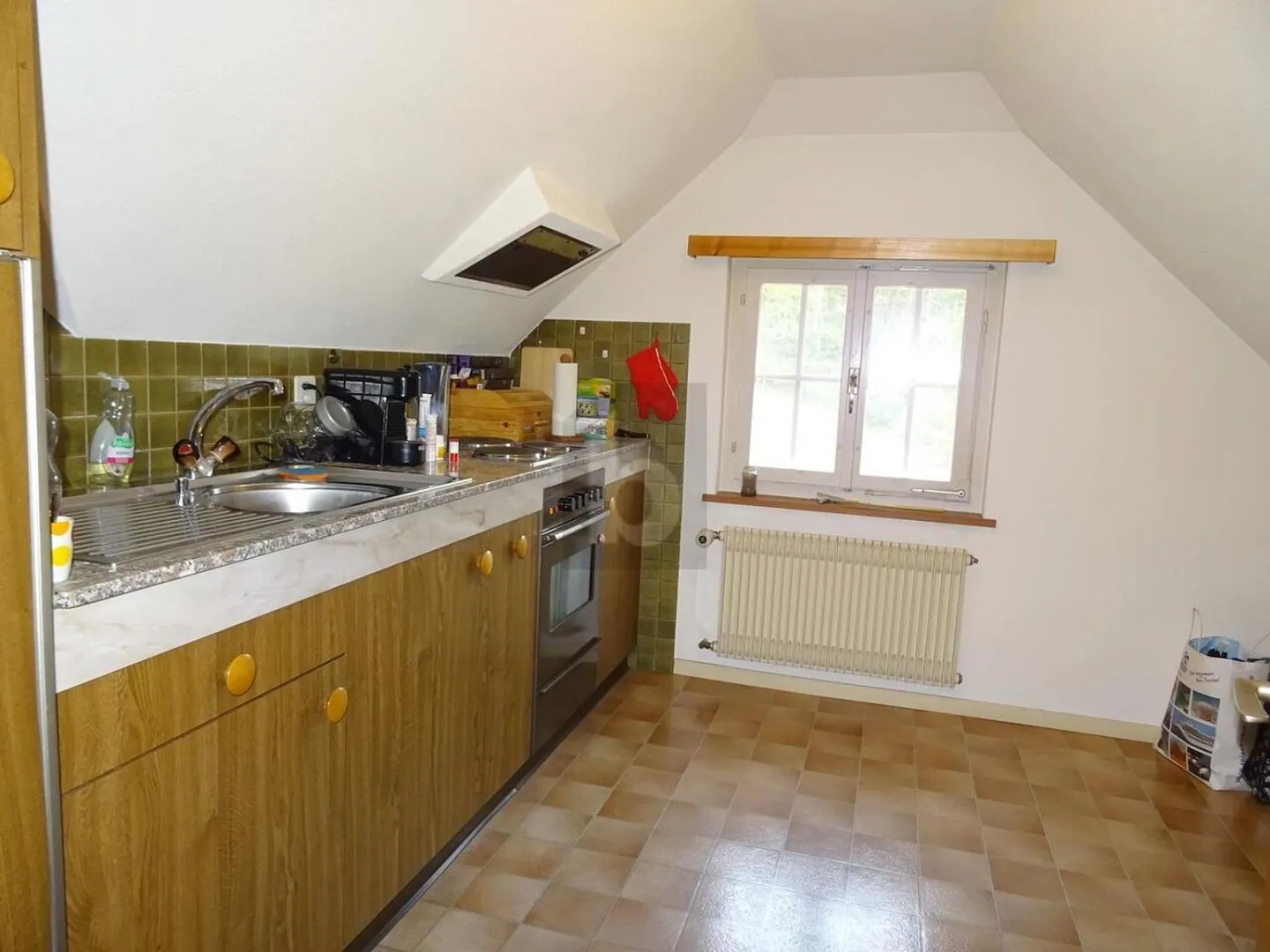 Charmante Dachgeschosswohnung mit Aussicht - Foto 3 von 5