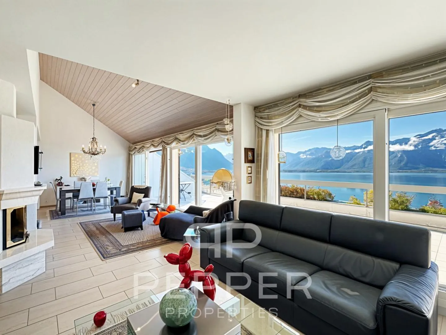 Duplex penthouse rare avec vue panoramique sur le lac Léman et les Alpes - Photo 6 sur 13