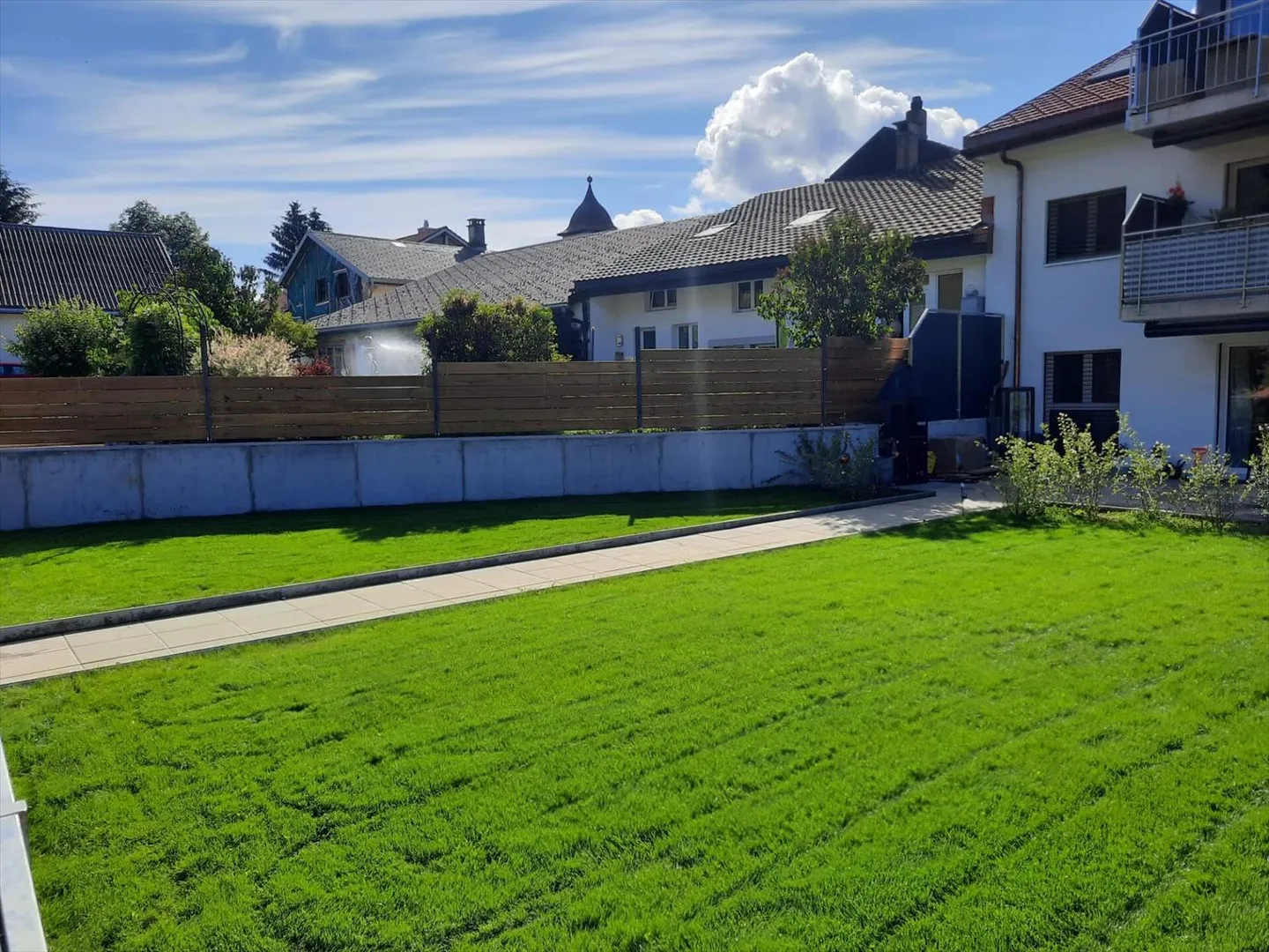 Appartement de 4.5 pièces avec accès à un jardin commun - Foto 8 von 10