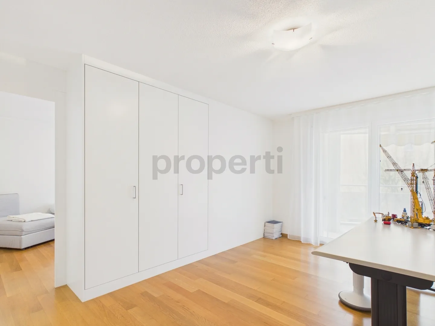 Geräumige Wohnung mit sonnigem Balkon - Foto 7 von 11