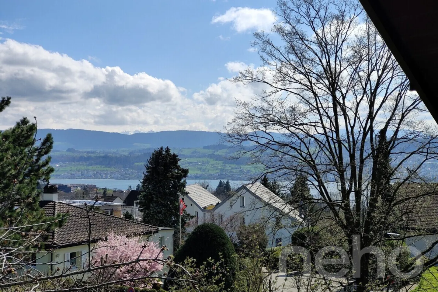 4.5-room maisonette apartment with additional room and partial lake view - Photo 1 of 13