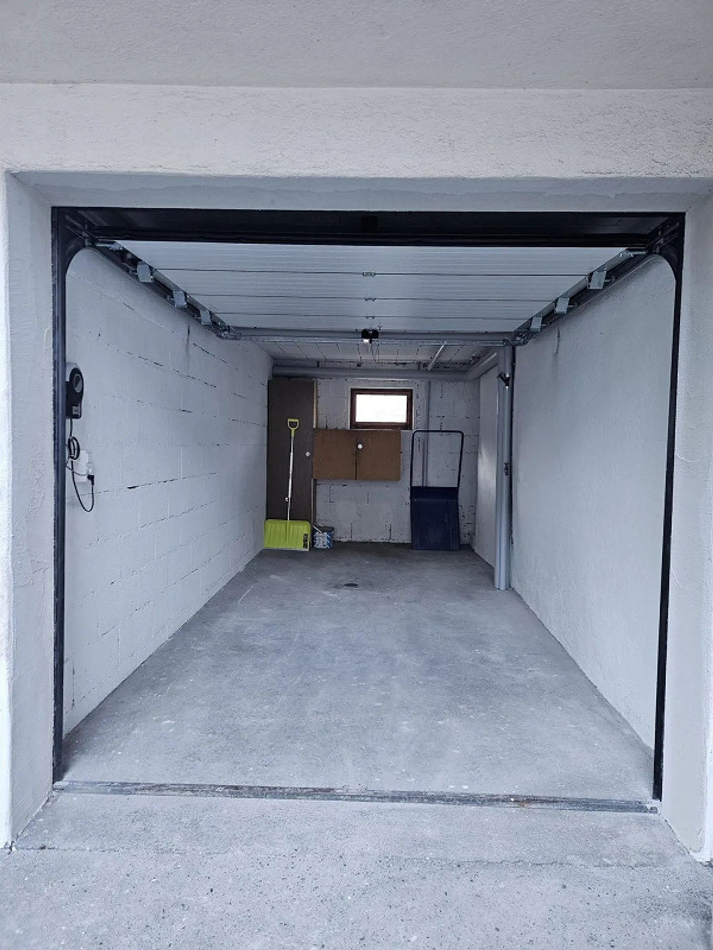 Spacious Garage with Window - Photo 2 of 4