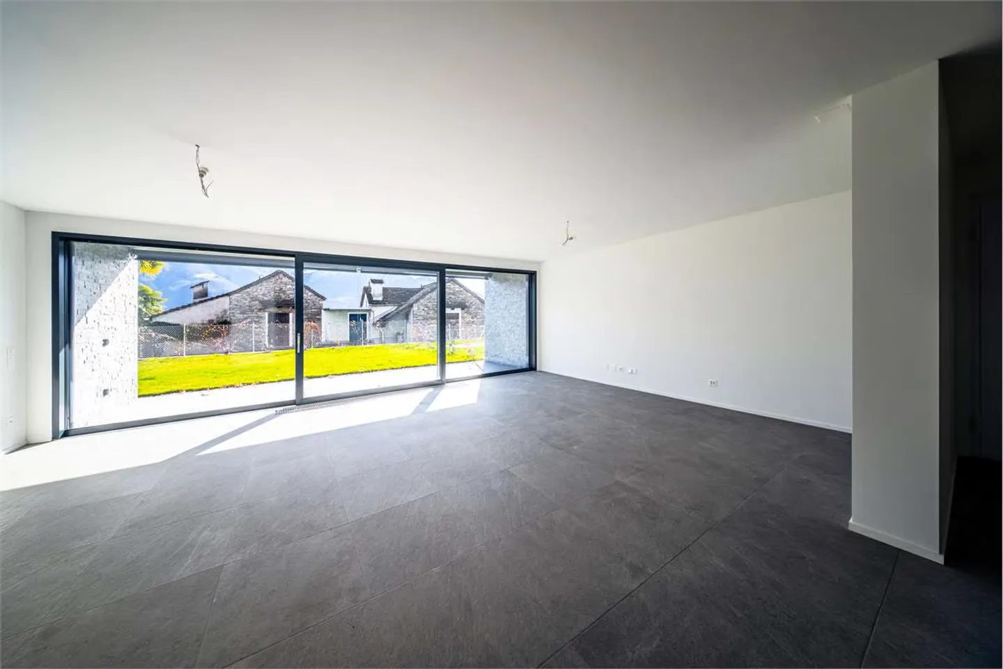 Appartement 3,5 pièces avec jardin NEUF Minusio vue sur le lac au rez-de-chaussée - Photo 10 sur 13