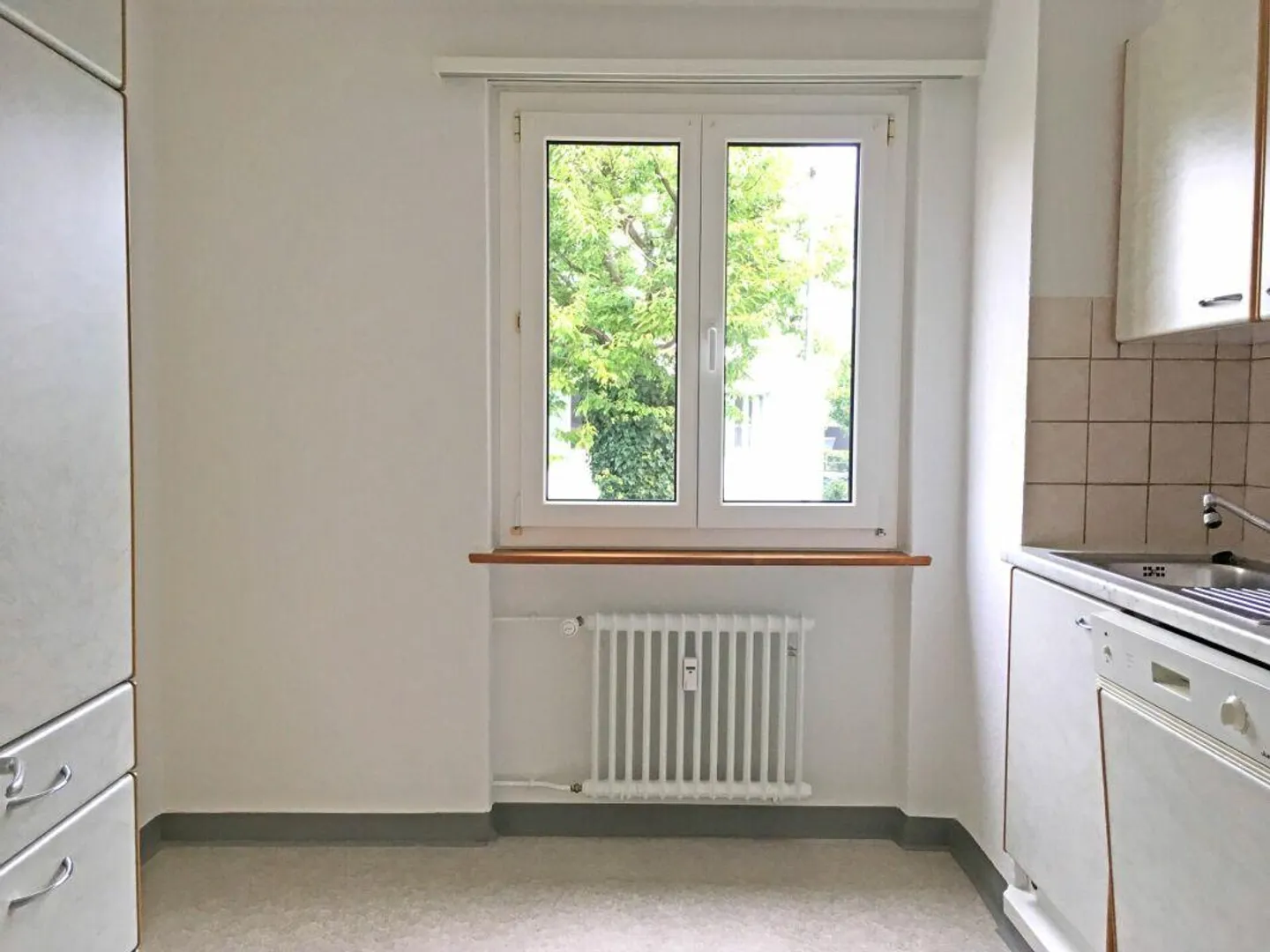 Appartamento luminoso con balcone e area giardino privata - Foto 7 di 13