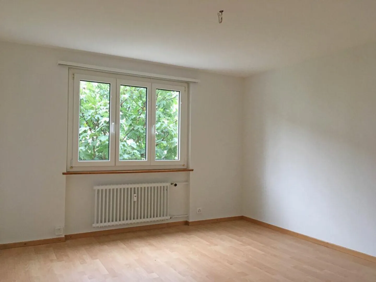 Appartamento luminoso con balcone e area giardino privata - Foto 8 di 13