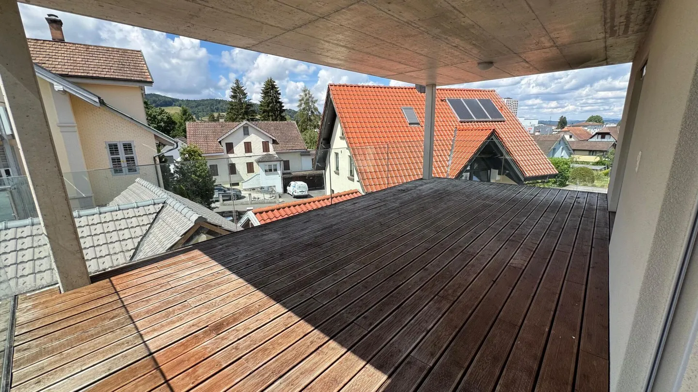 Modern 4.5-room apartment with large terrace including garage & outdoor parking - Photo 8 of 8
