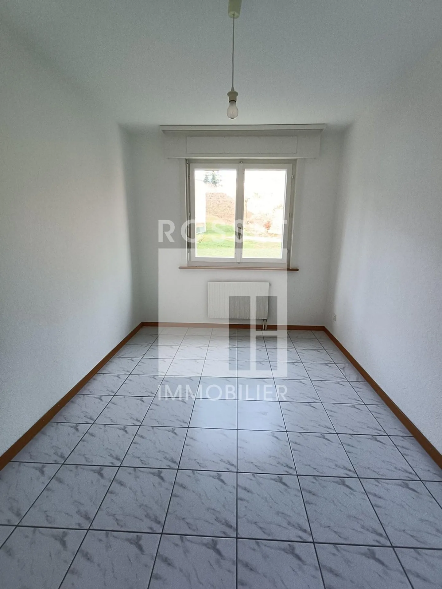 Appartement de quatre pièces au premier étage - Photo 4 sur 9