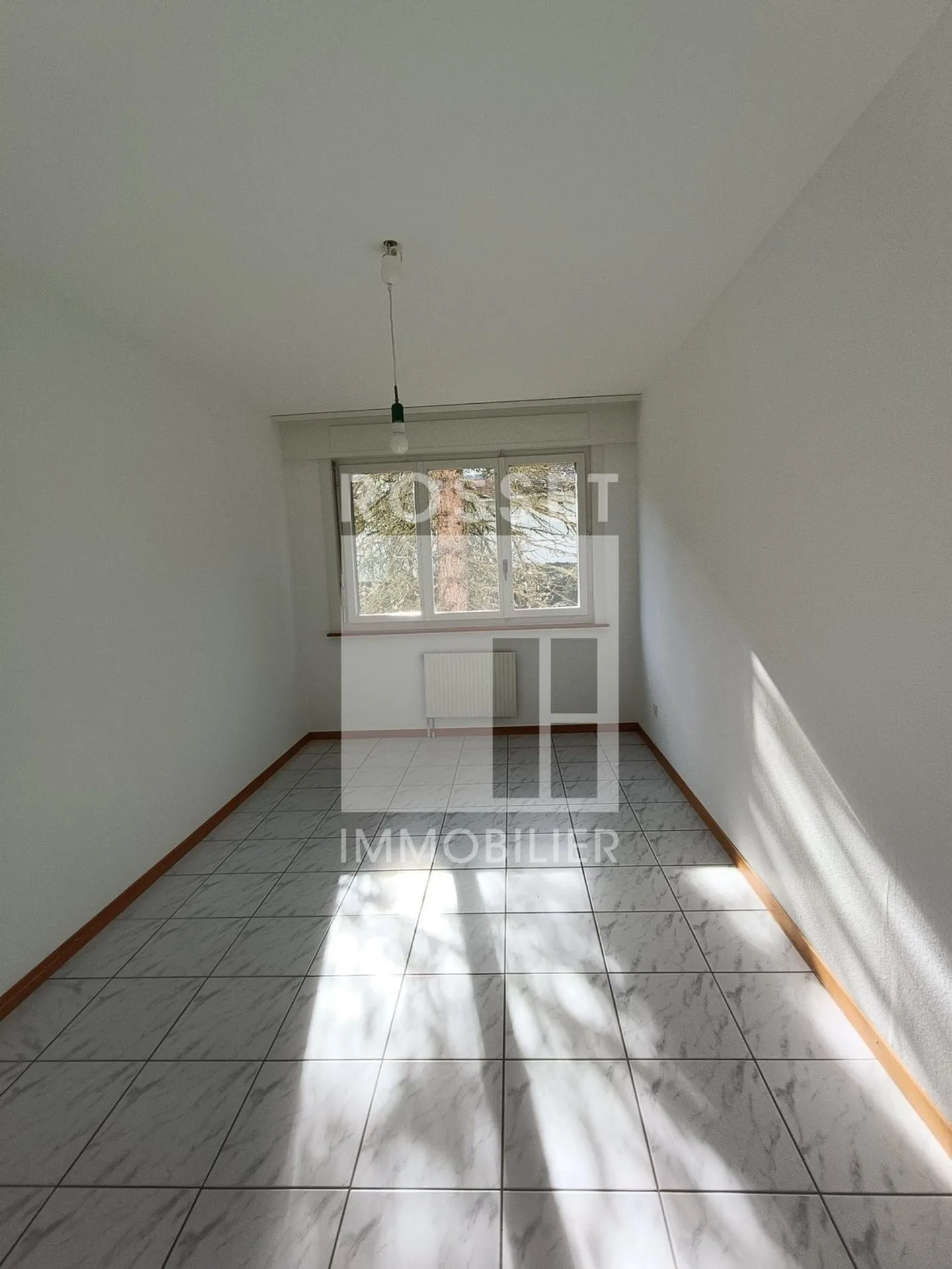 Appartement de quatre pièces au premier étage - Photo 6 sur 9