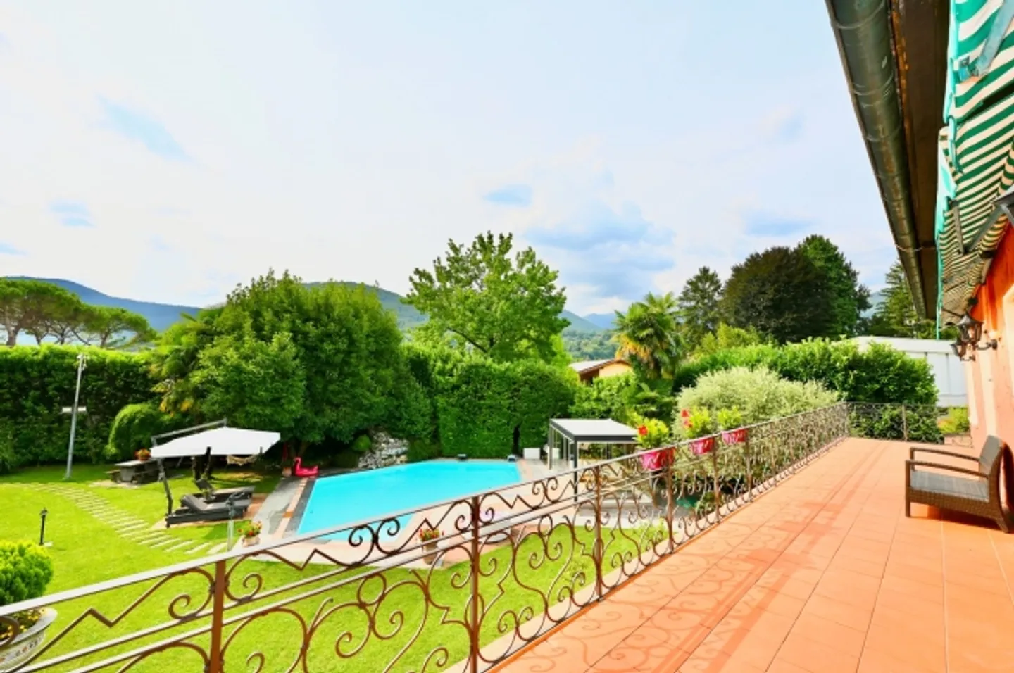 Elegant villa with magnificent pool and lush garden in Caslano - Photo 16 of 20