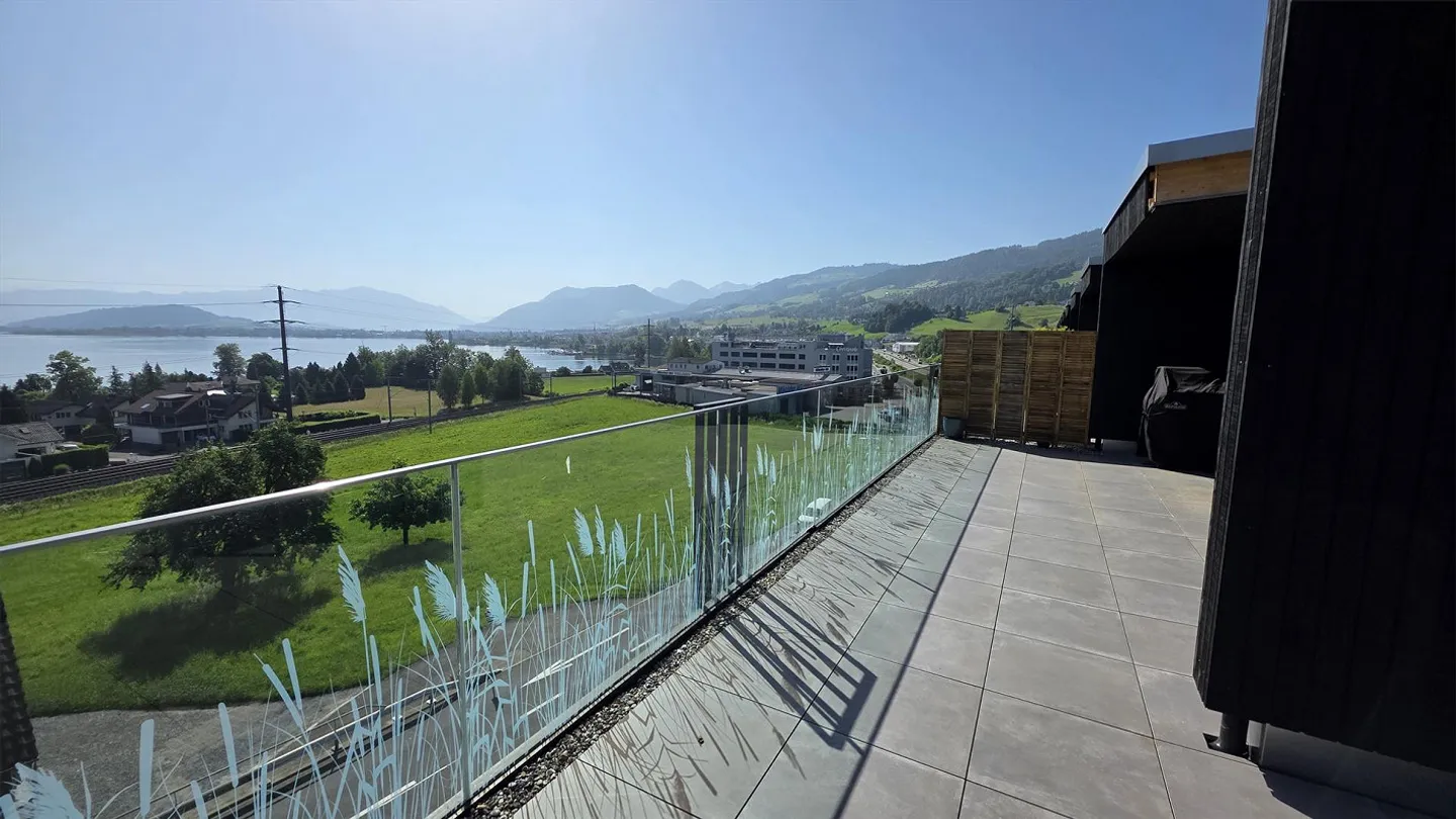 Wunderschöne Attikawohnung mit Seeblick - Foto 2 von 12