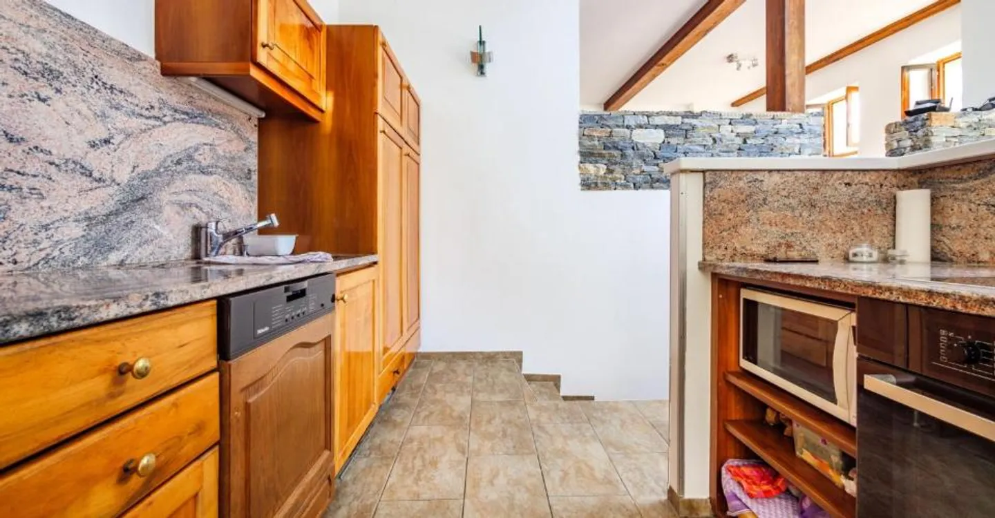Einmalige Gelegenheit: Haus mit zwei unabhängigen Wohnungen (5,5 und 2,5 Zimmer) - Foto 6 von 10