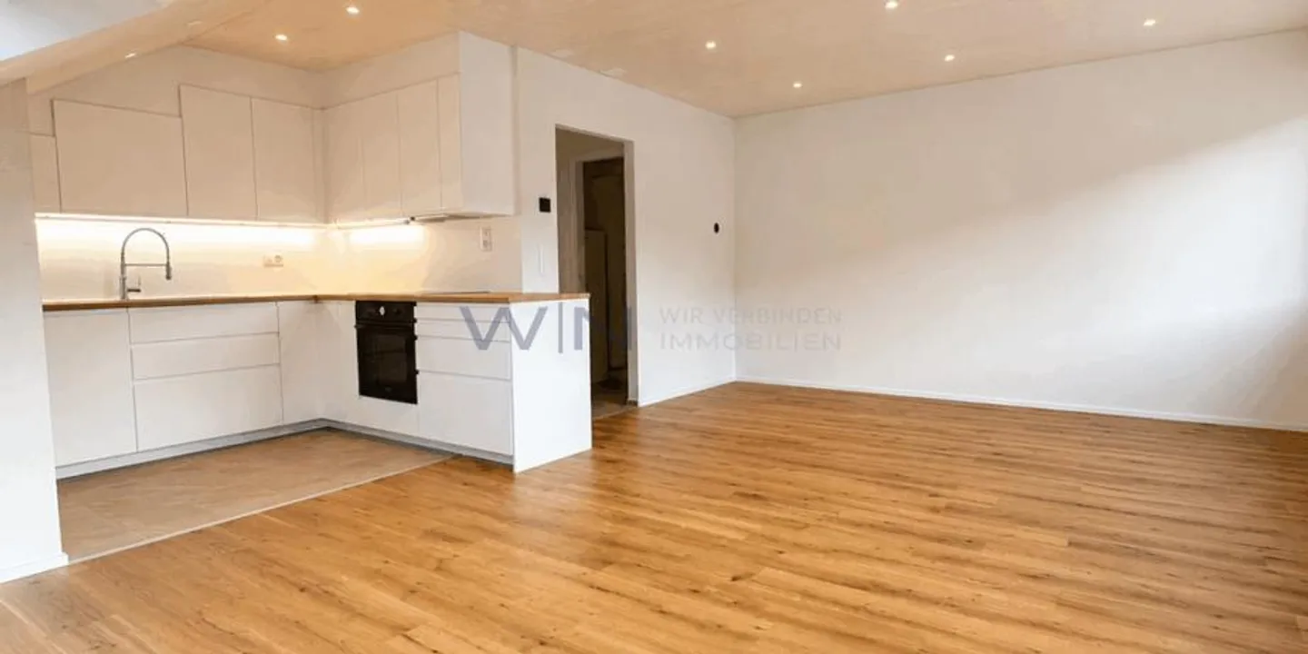 High-quality apartment including parking space - Photo 3 of 13