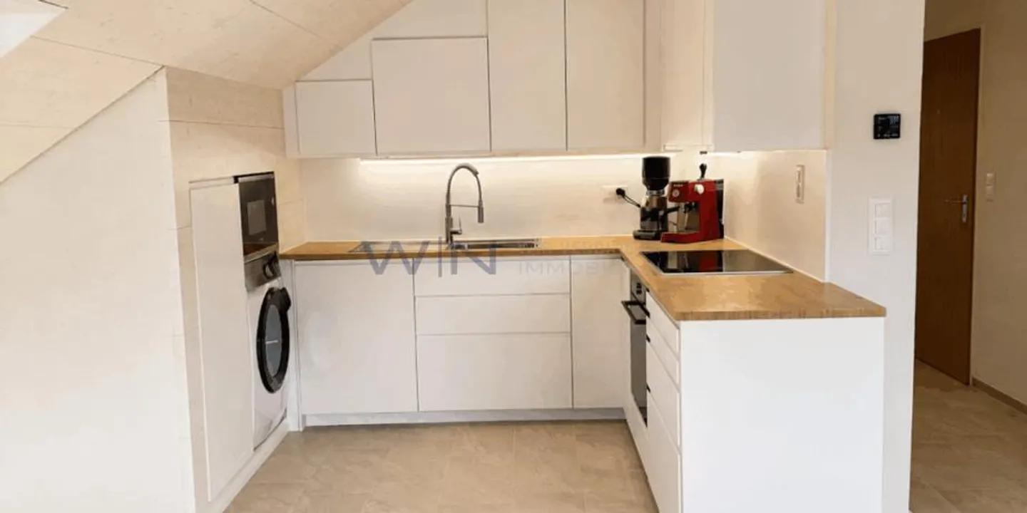 High-quality apartment including parking space - Photo 4 of 13