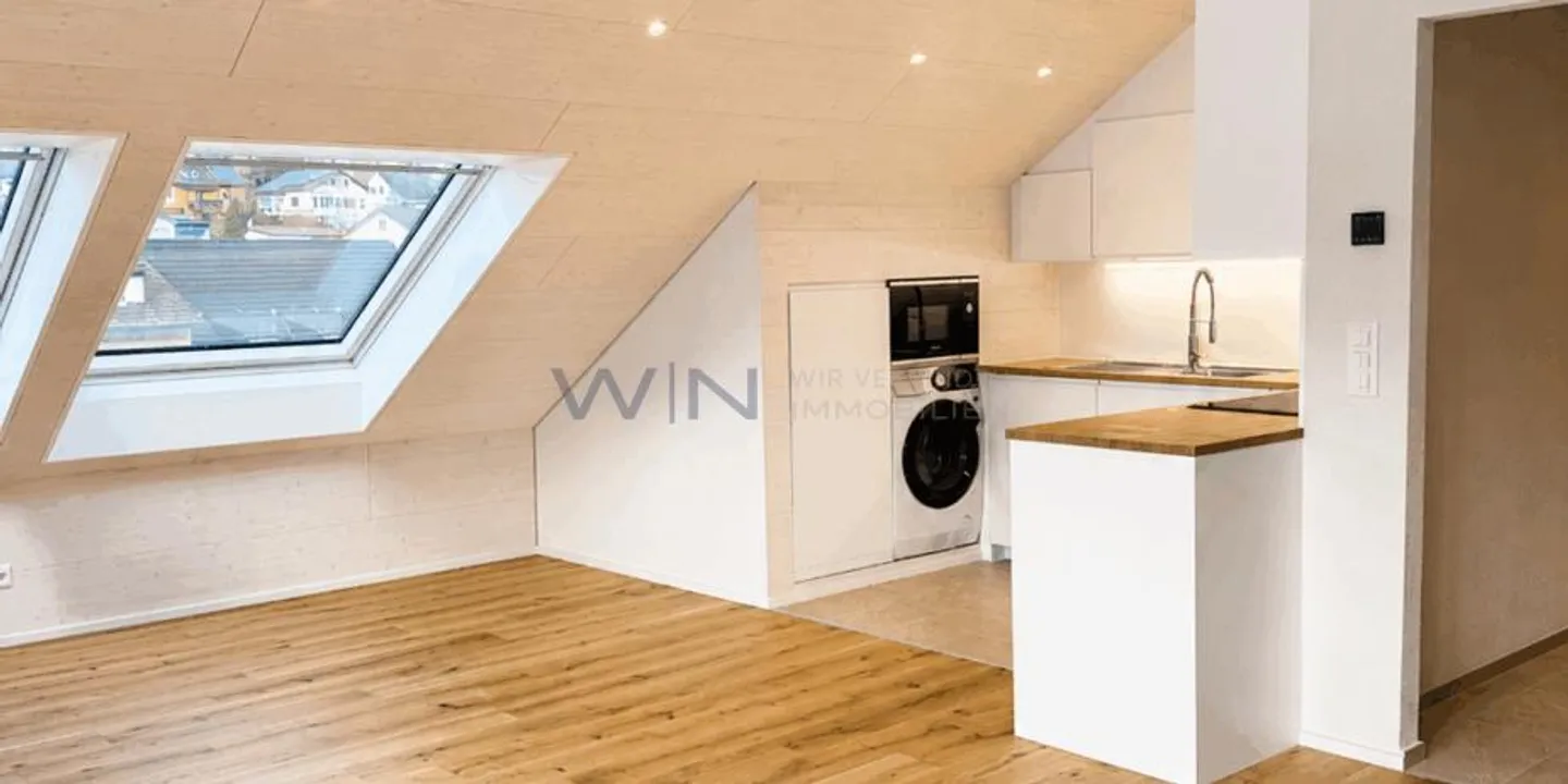 High-quality apartment including parking space - Photo 5 of 13
