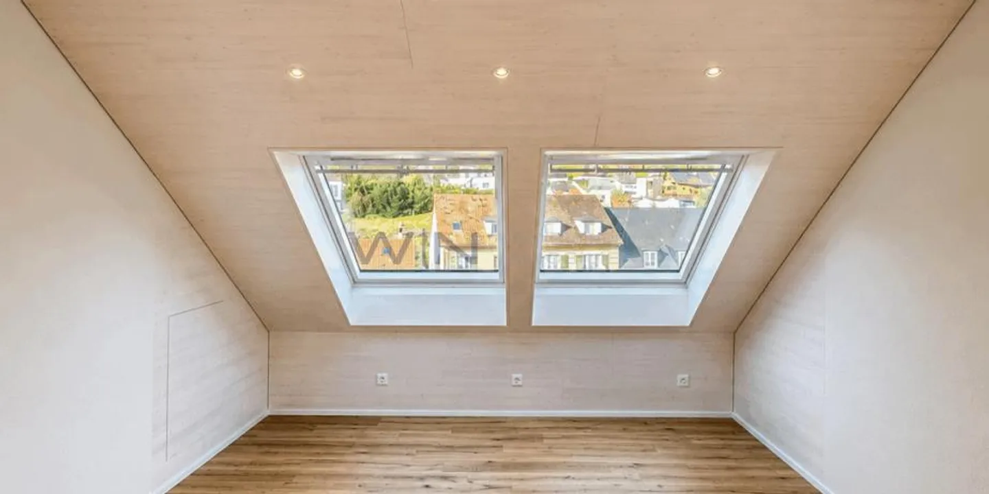 High-quality apartment including parking space - Photo 9 of 13