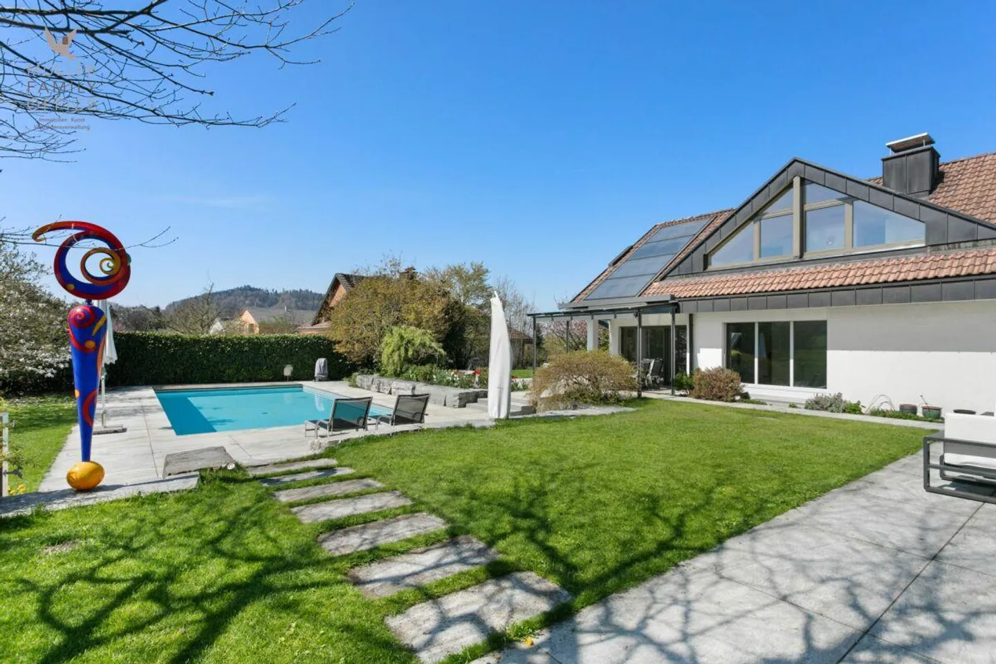 Elegant Single-Family Home with Dreamlike Garden and Pool Oasis - Photo 2 of 13