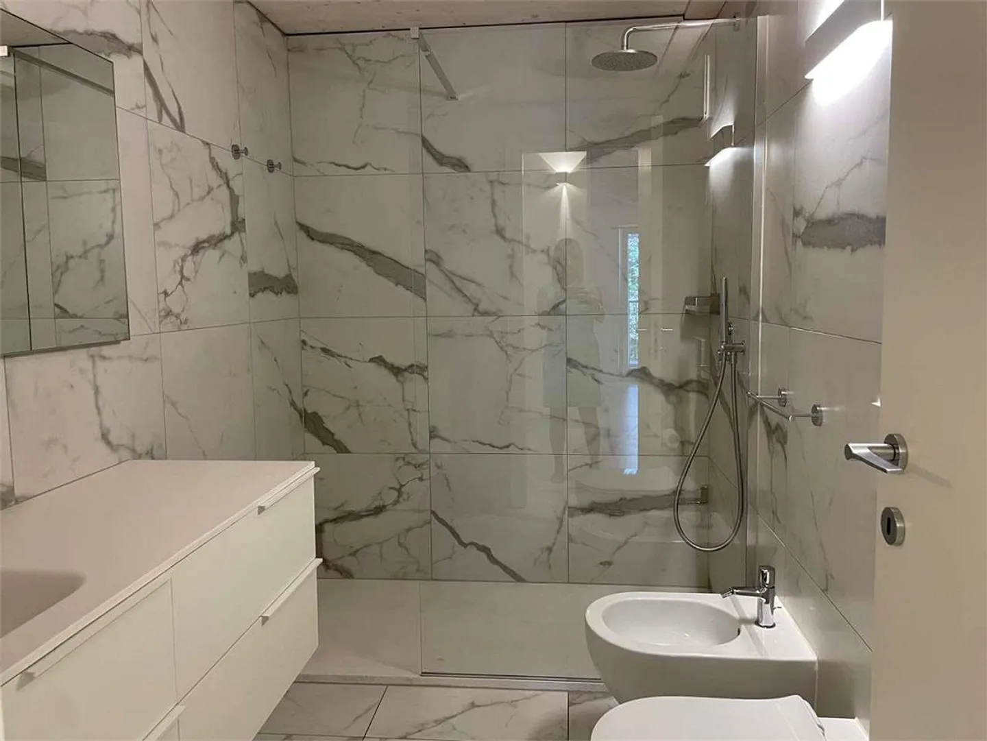 Gentilino: elegant 2.5-room apartment with livable loft - Photo 10 of 12