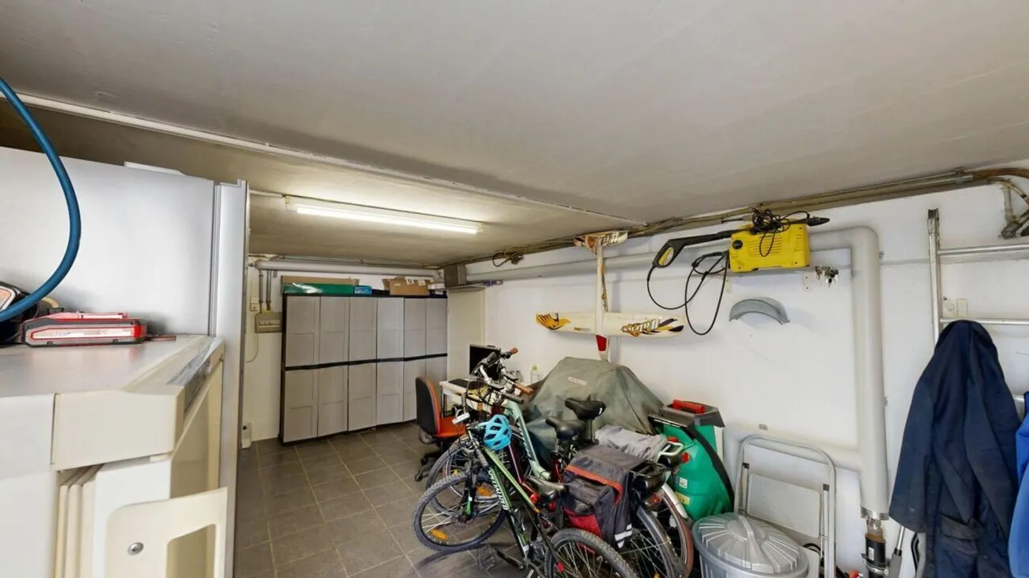 Charmantes Hausteil mit Atelier und Garten - Foto 16 von 17