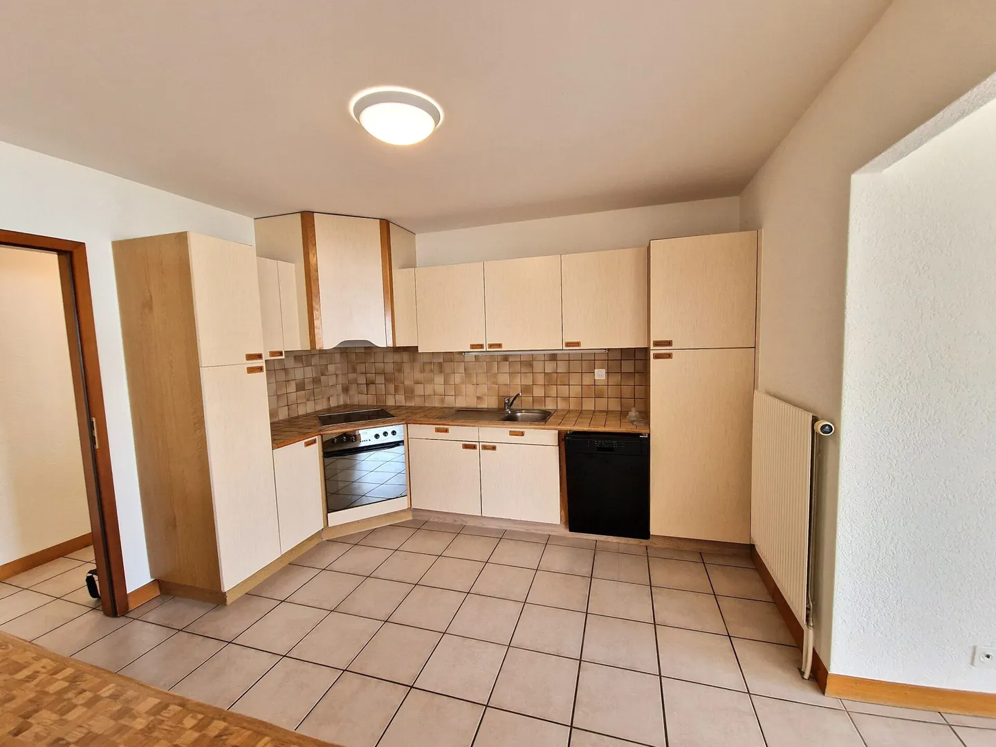 Appartement spacieux en zone industrielle - Photo 10 sur 12