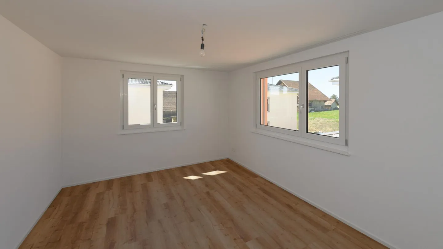 Neues Familienhaus mit Garten - Foto 10 von 11