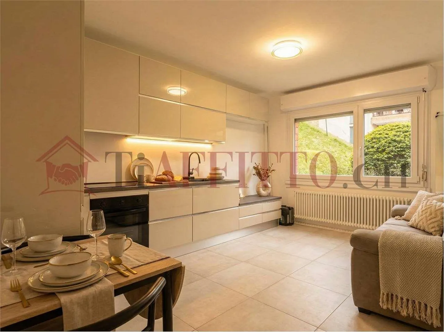 Appartement 2,5 pièces meublé et rénové avec buanderie privée - Photo 1 sur 6