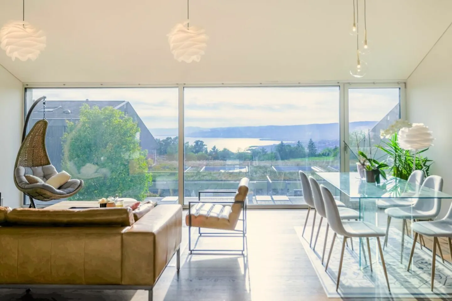 Casa a schiera di 6,5 locali con giardino e vista lago - Foto 1 di 11