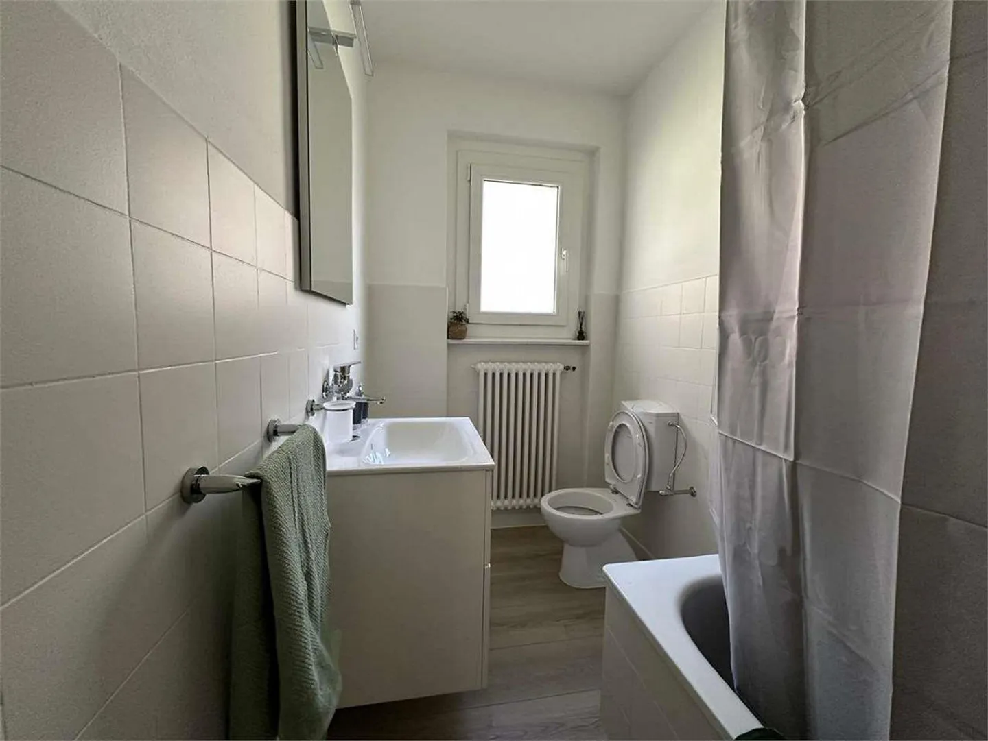 Bodio, excellent 3.5 with balcony and open view - Photo 12 of 13