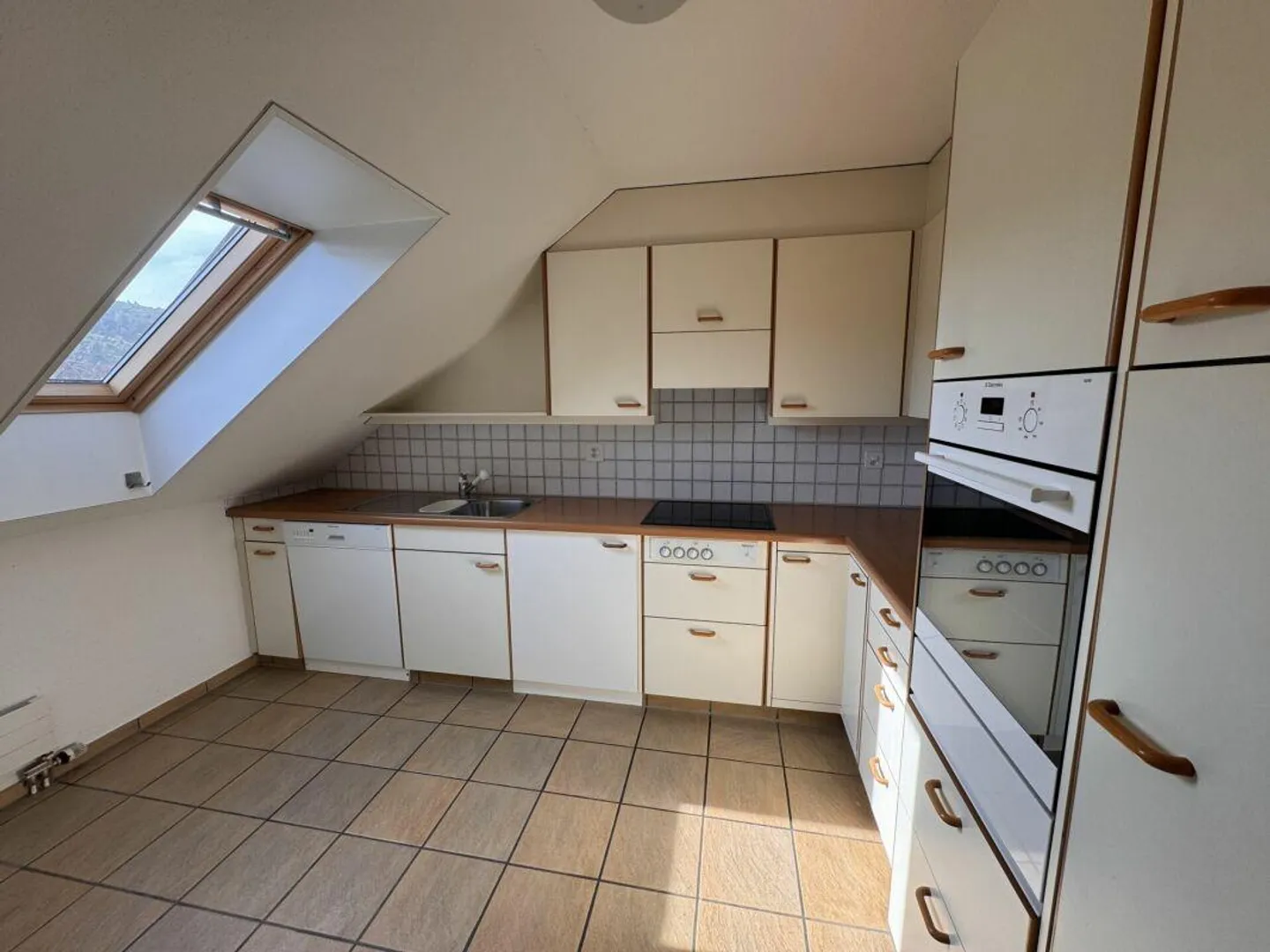 Bright and Cozy Attic Apartment with Charm - Photo 2 of 8