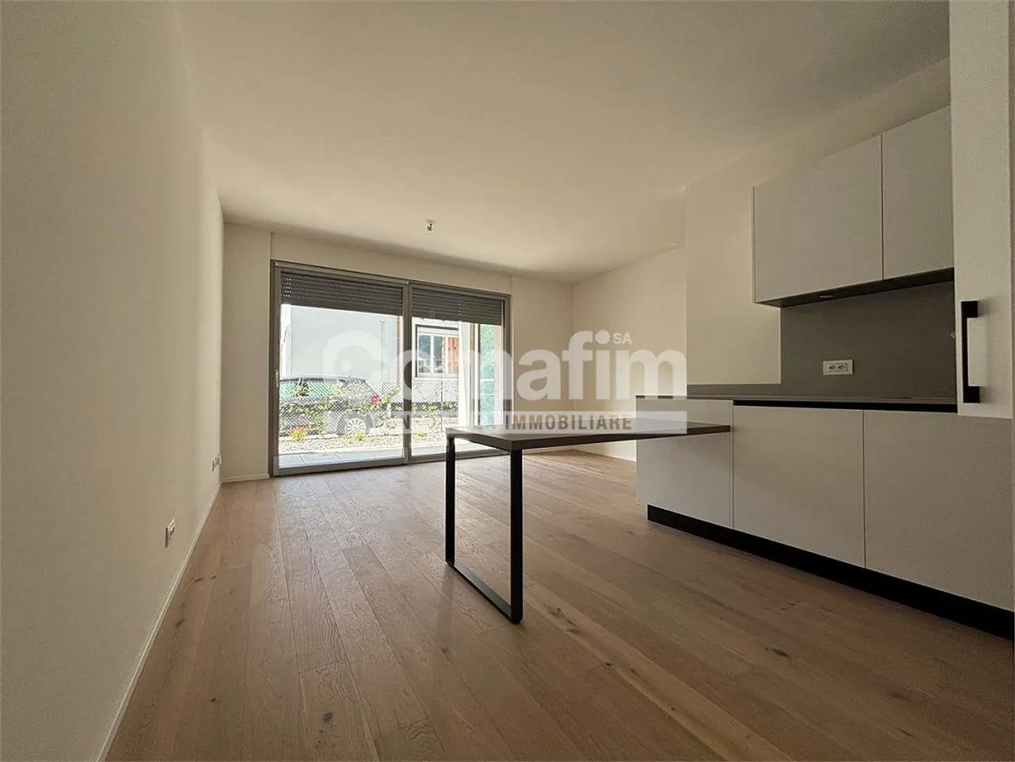 Chiasso: 2.5 rooms on the ground floor with terrace and garden - Photo 3 of 13