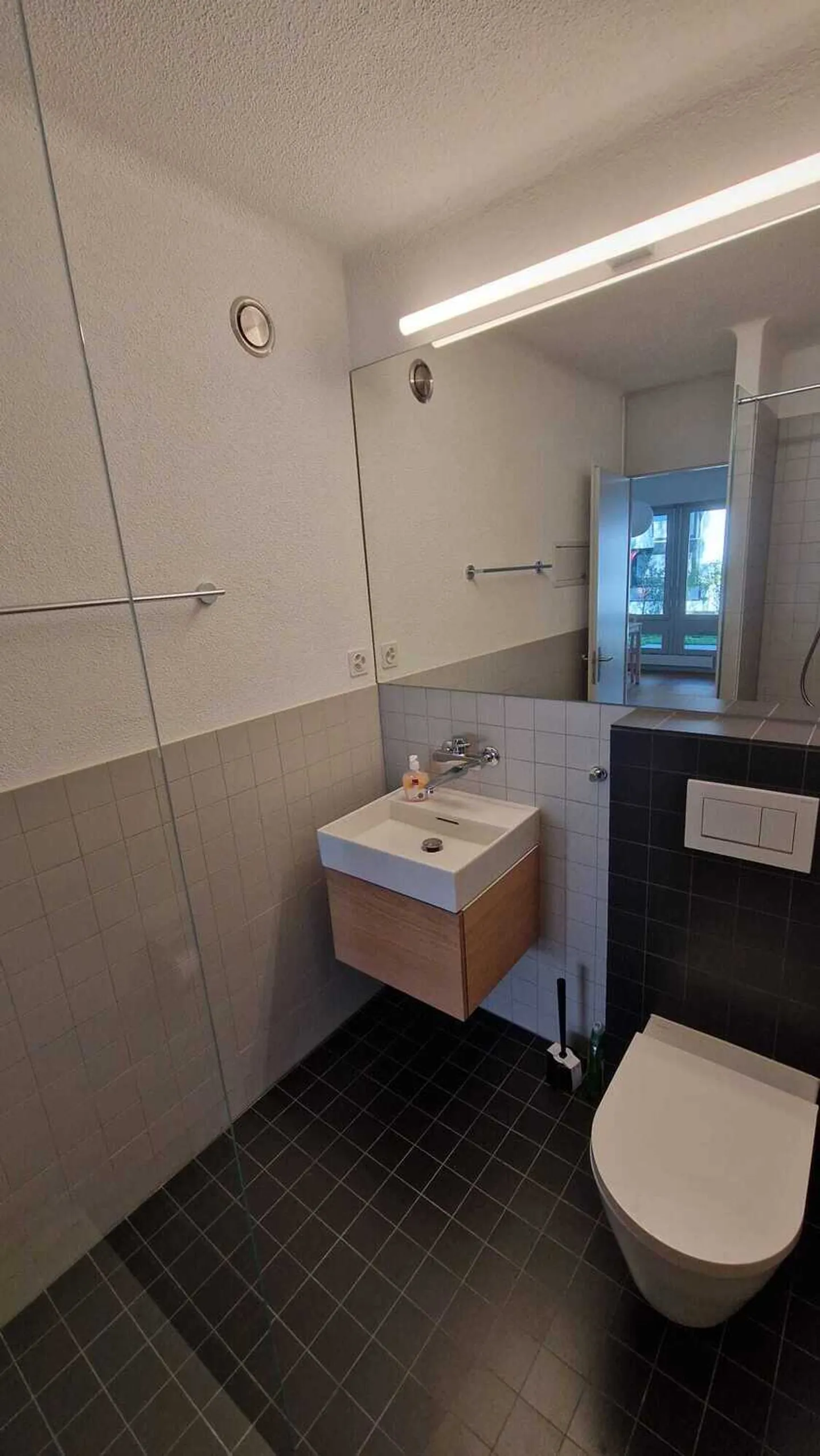 Appartement spacieux avec accès jardin - Photo 9 sur 10