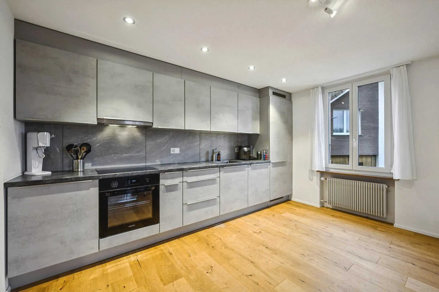 Modern renovated multi-family house with three units in a quiet location - Photo 3 of 13