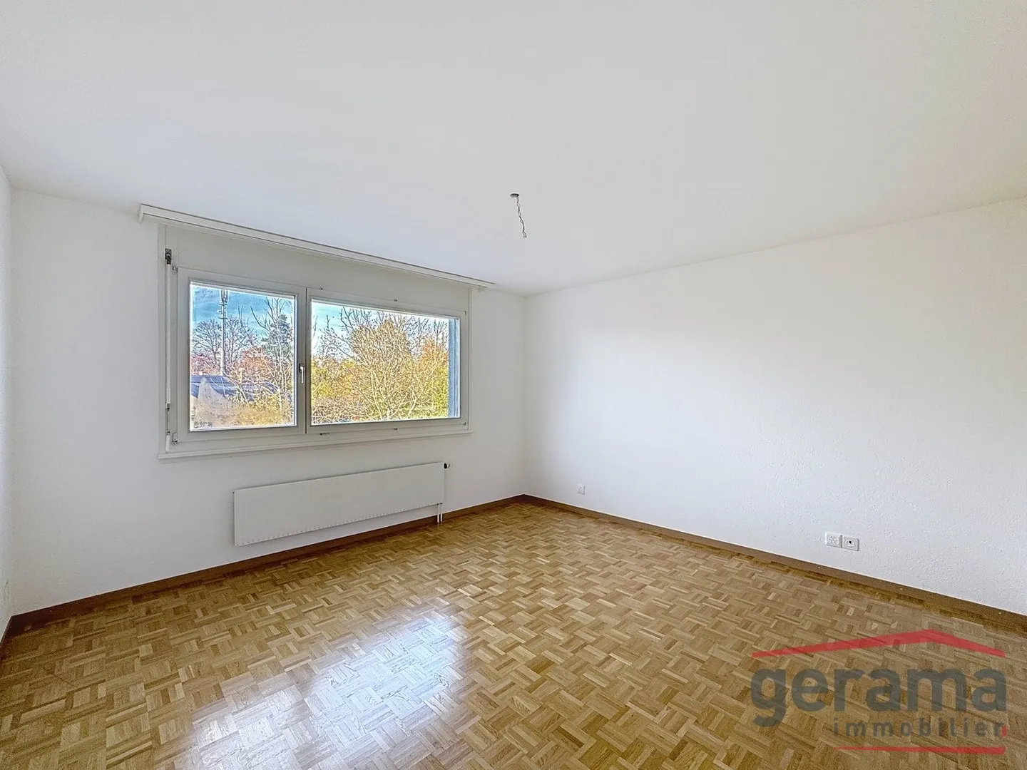 Spacieux 4.5 pièces sur les hauts de Fribourg - Photo 3 sur 10