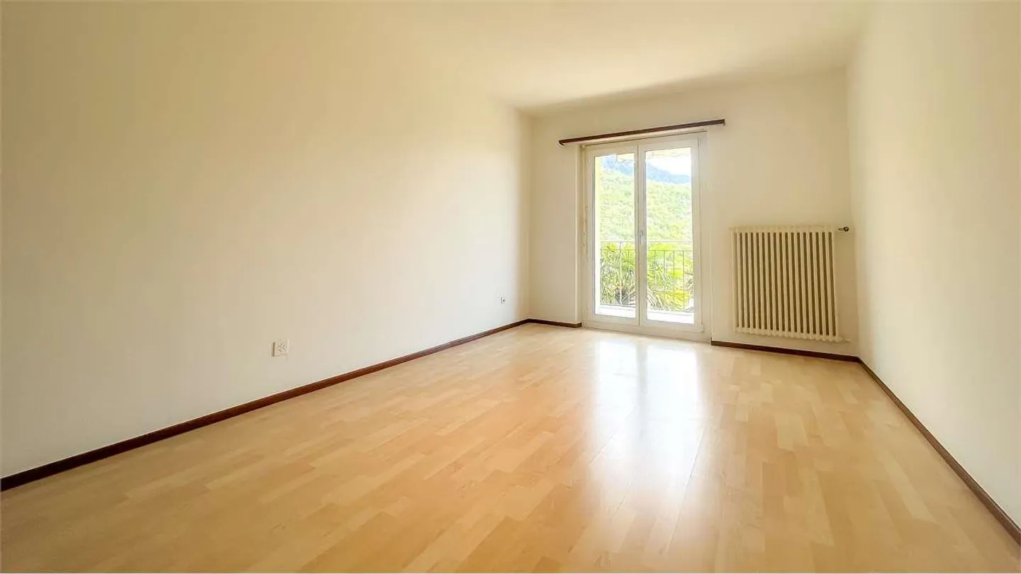Appartement accueillant de 3,5 pièces avec balcon et vue dégagée - Photo 6 sur 8