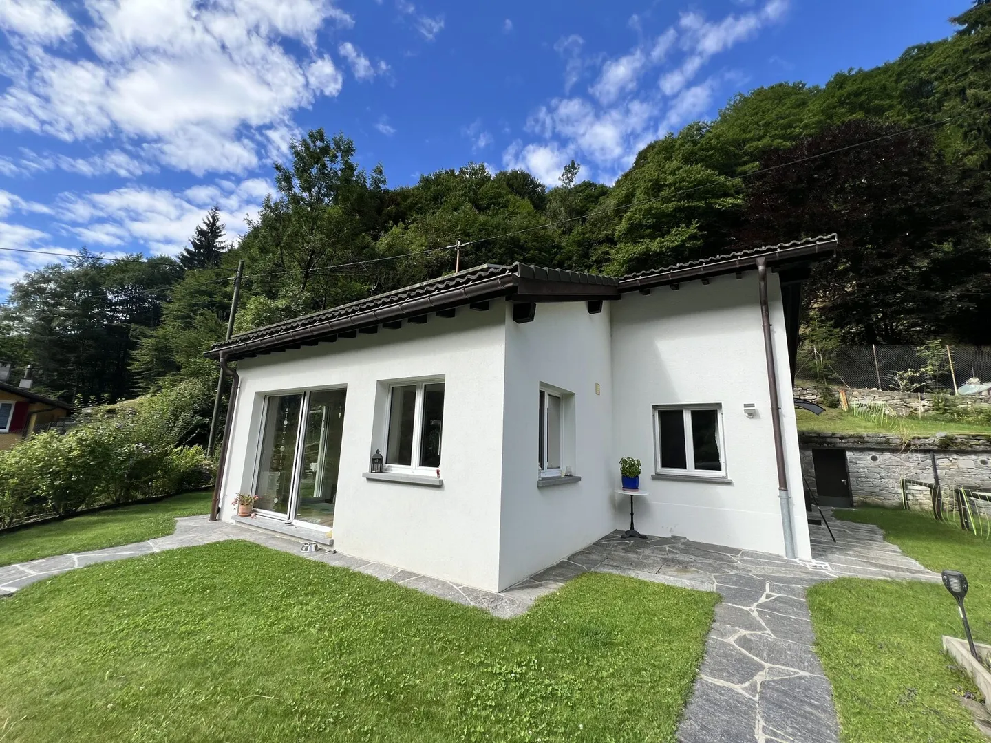 Maison individuelle avec 4,5 pièces, jardin et terrain - Photo 1 sur 16